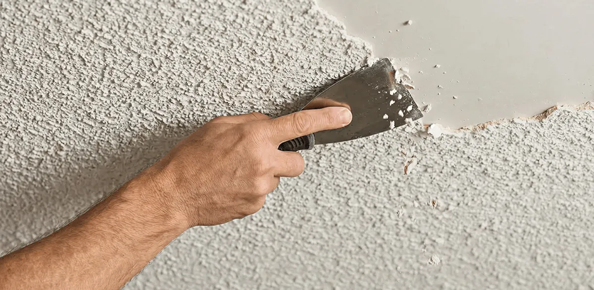 Popcorn ceiling removal scraping off textured ceiling finish in San Diego, CA